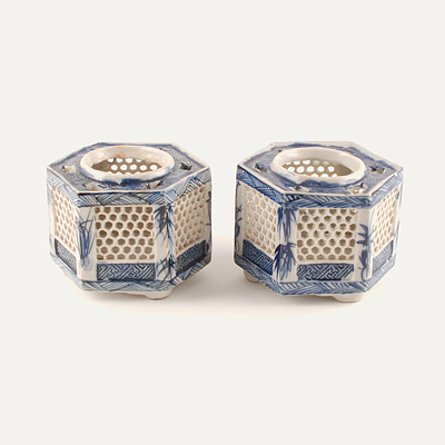 A pair of blue and white candle-holders, China, Qing Dynasty, mid 19th century