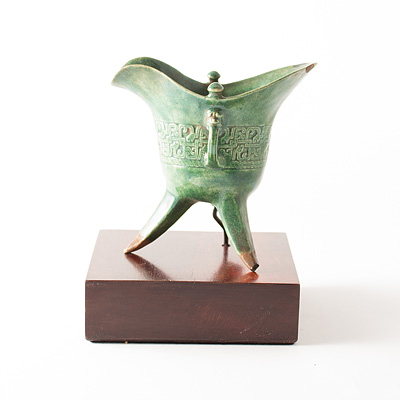 Rare green glazed biscuit fired porcelain shaped libation cup, China, Kangxi, early 18th century